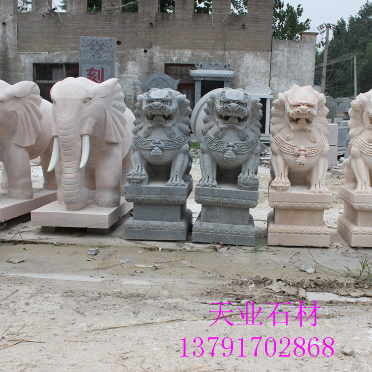 济宁市石雕石狮子厂家石雕石狮子 厂家供应大理石狮子  镇宅辟邪石狮子质量保证