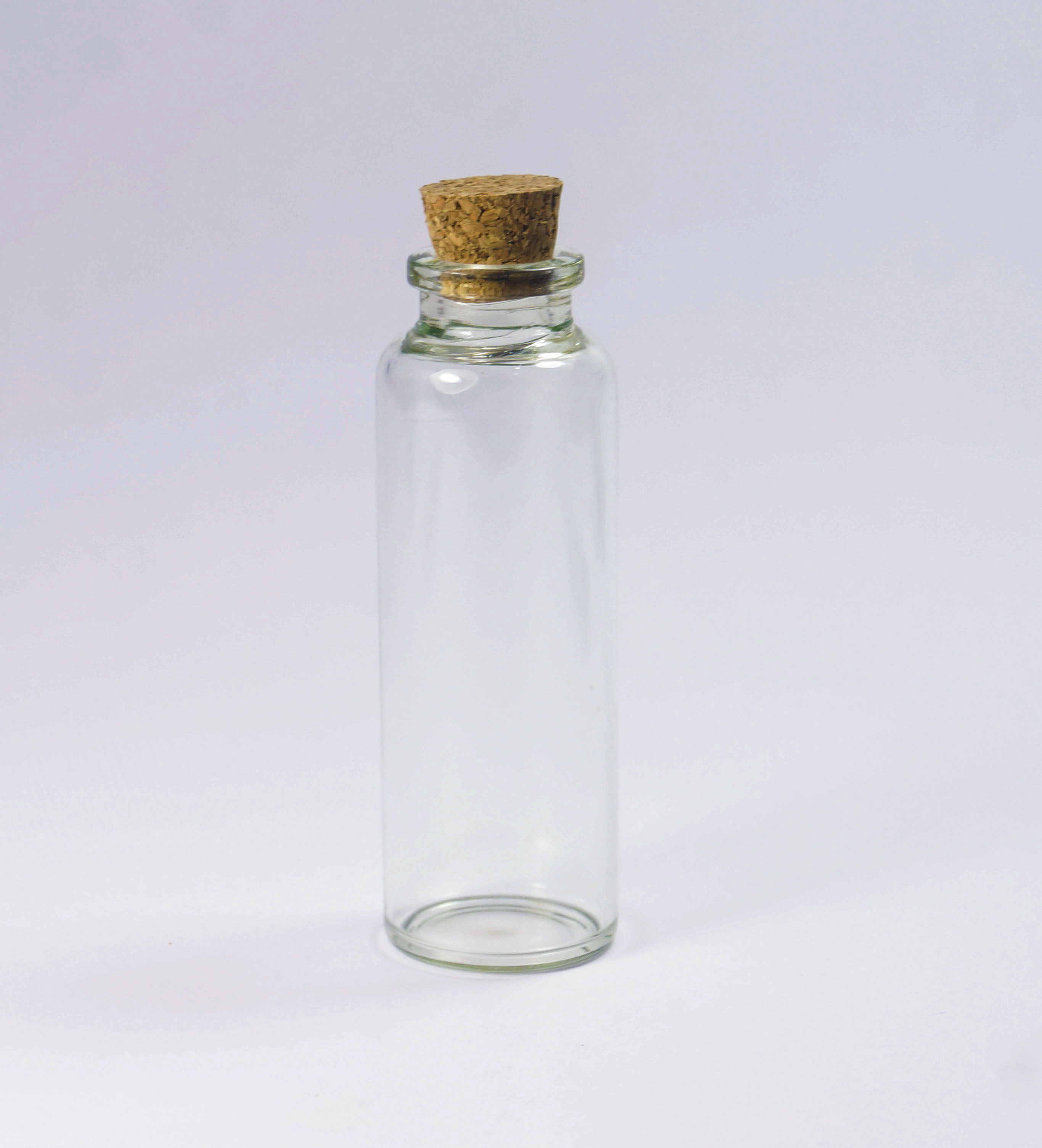 供应批发透明玻璃瓶 茶色玻璃瓶 配木塞玻璃瓶 包装瓶 液体包装瓶 粉末包装瓶，防漏玻璃瓶图片