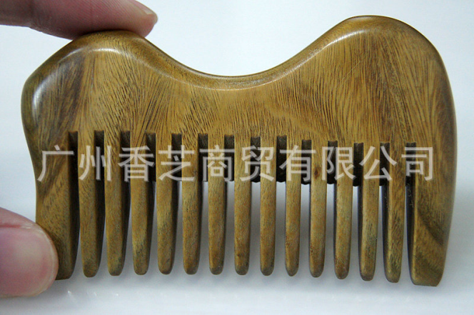 台湾高品质檀木木梳 促进血液循环厂家  檀香木梳批发图片