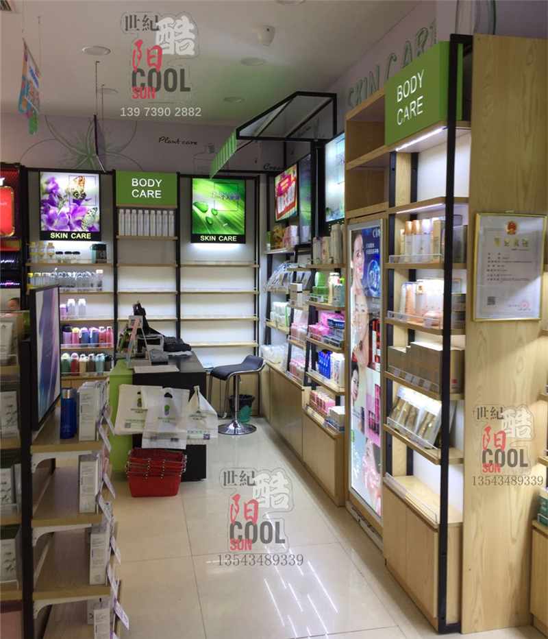 广州市化妆品店柜台展示柜装修设计效果图厂家