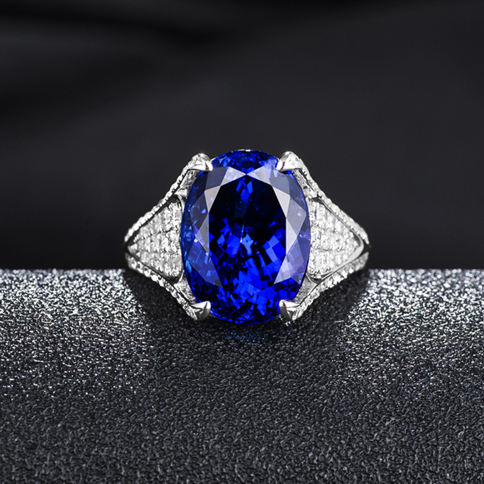 8.09椭圆形坦桑石戒指5A坦桑石的价格18K金钻石镶嵌个性款式颜色好坦桑尼亚蓝宝石图片
