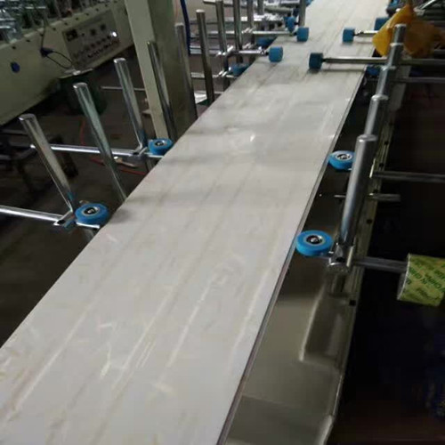 河南墙板包覆机 扣板包覆膜机厂家直销包教技术
