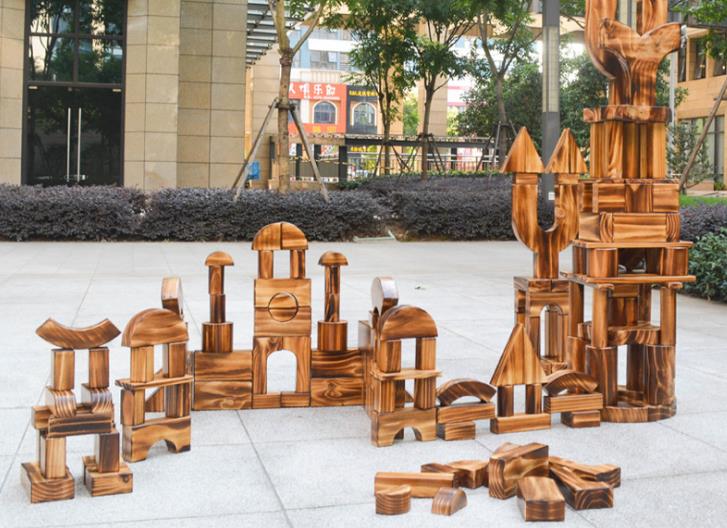 幼儿园原木积木大型建构碳化积木防腐火烧木美松木实木碳化大积木图片