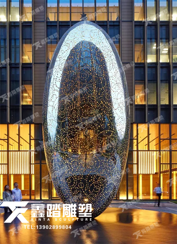 椭圆形广场发光不锈钢雕塑 内置LED灯带 圆形穿孔造型透光好  表面镜面非常透亮图片